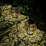 Upload the image to the gallery viewer: Solar-powered LED lantern with floral design
