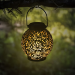 Upload the image to the gallery viewer: Solar-powered LED lantern with floral design
